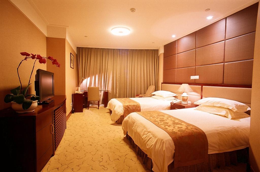 Shanghai Hengsheng Peninsula International Hotel Habitación foto
